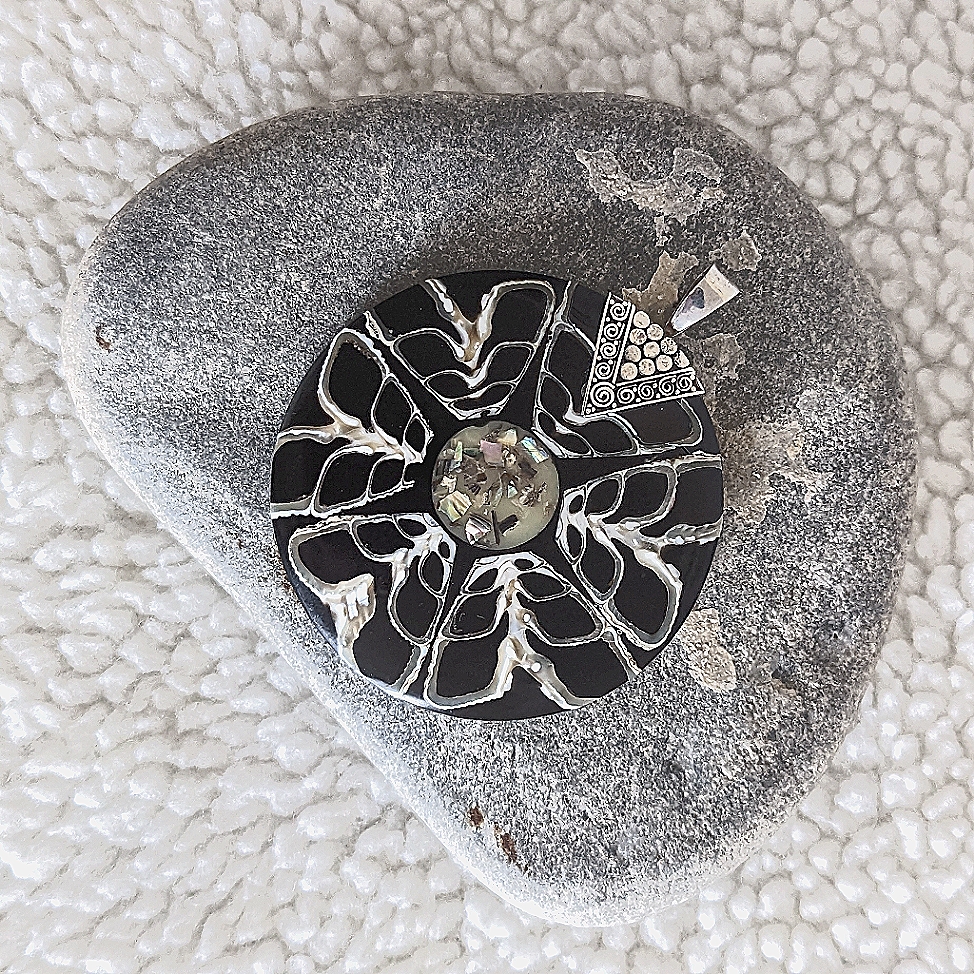 A Shell Pendant!